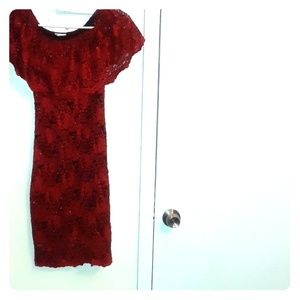 Red with black sequence holiday/cocktail dress.
